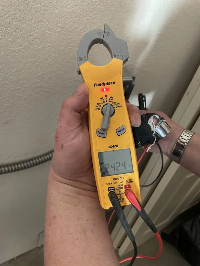 Voltage testing with clamp meter during Outlet Installation in Shrewsbury